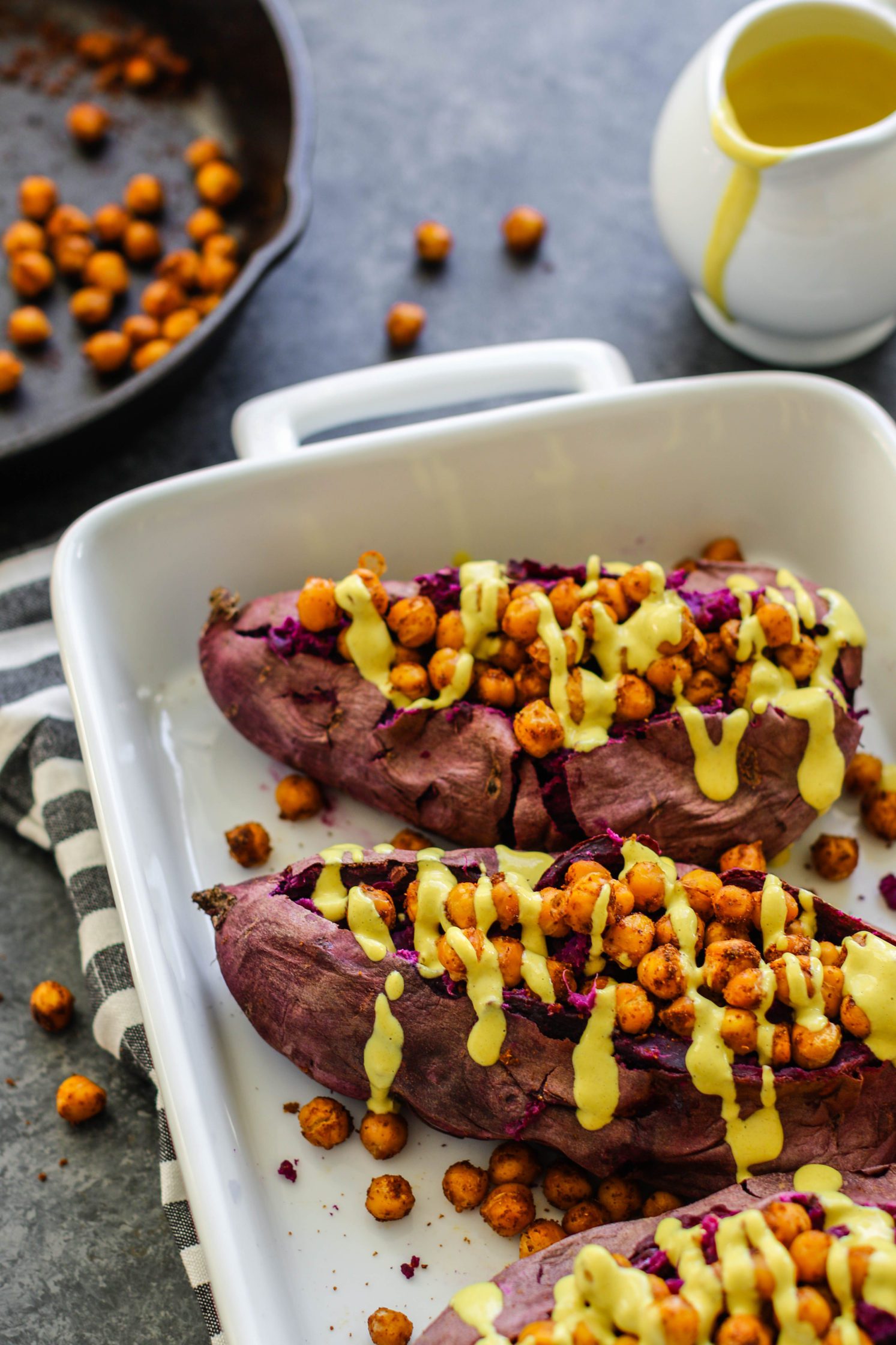 Purple Stuffed Sweet Potatoes with turmeric tahini drizzled