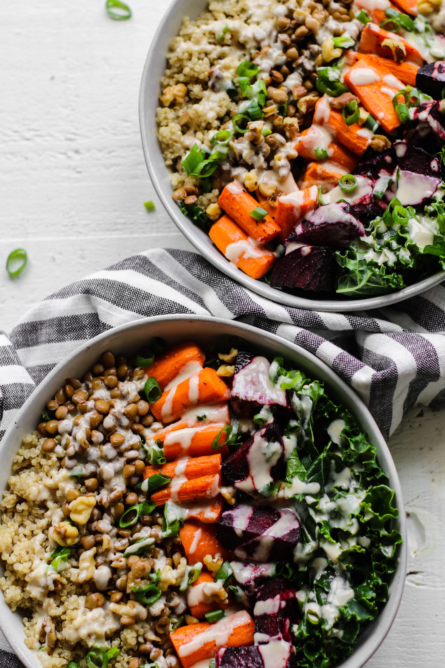 Roasted Beet Macro Bowl served in bowls with lemon tahini dressing by Flora & Vino