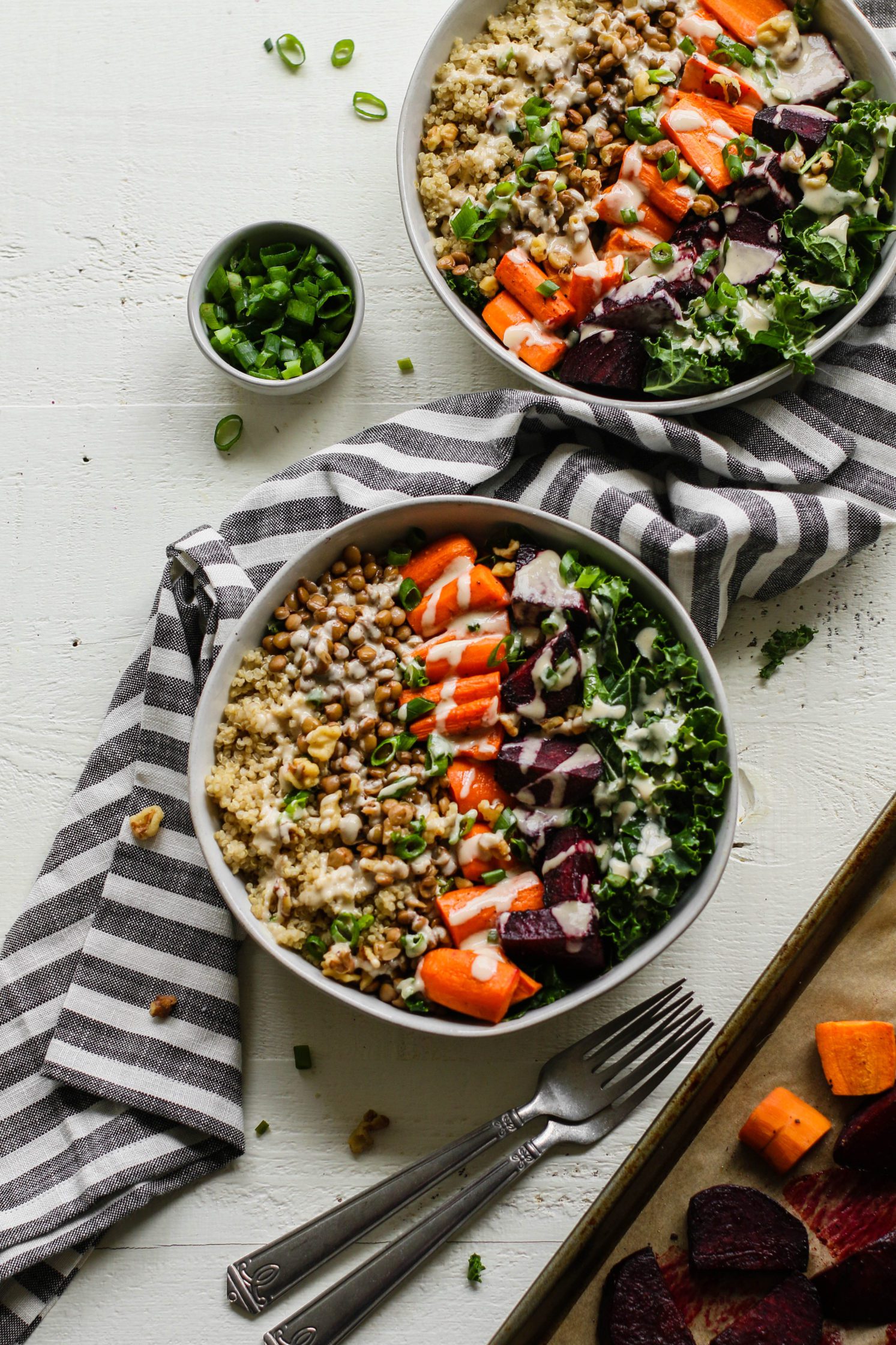 Roasted Beet Macro Bowl with lemon tahini dressing served in bowls by Flora & Vino