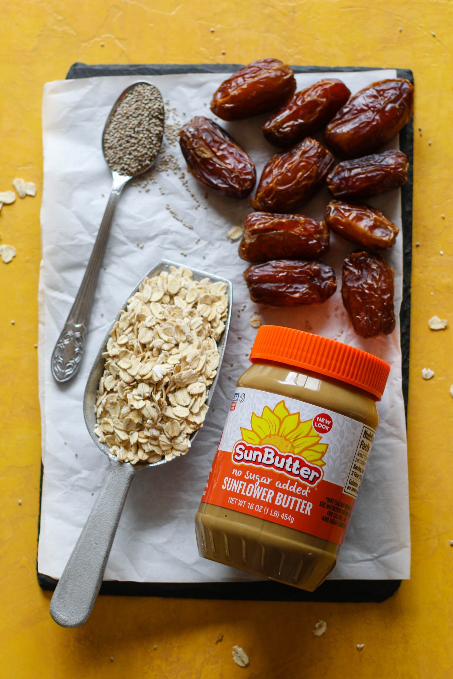oats, SunButter, chia seeds, and Medjool dates on board by Flora & Vino