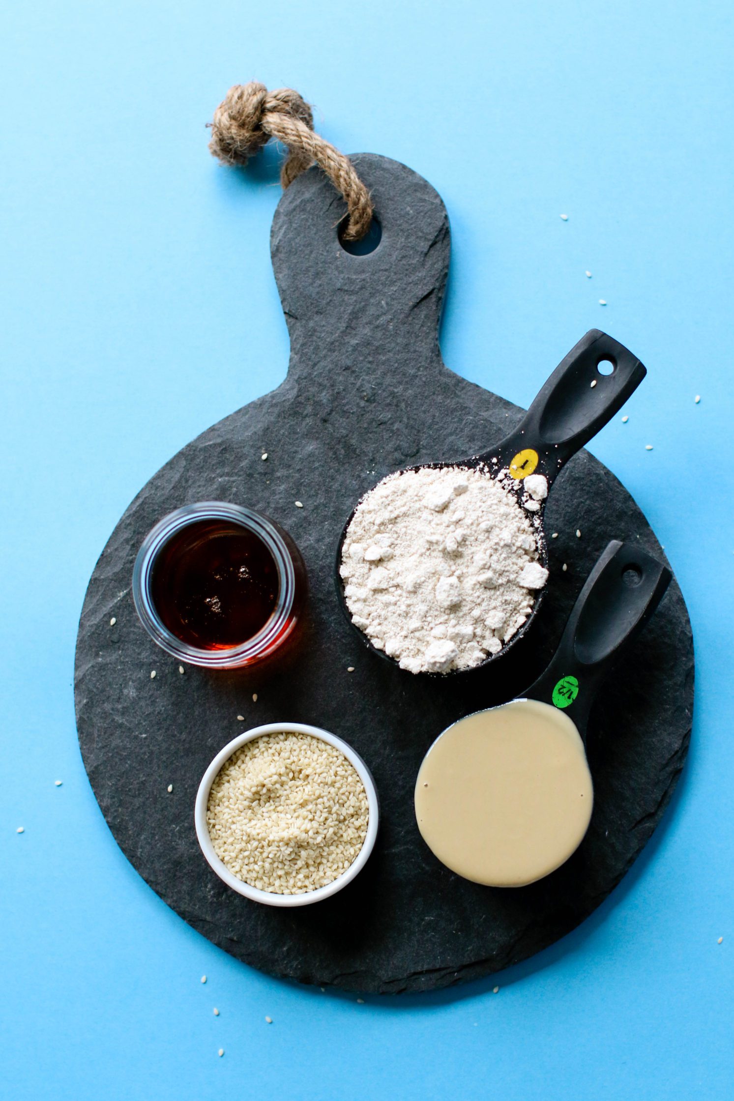 oat flour, tahini, sesame seeds, and maple syrup on board by Flora & Vino