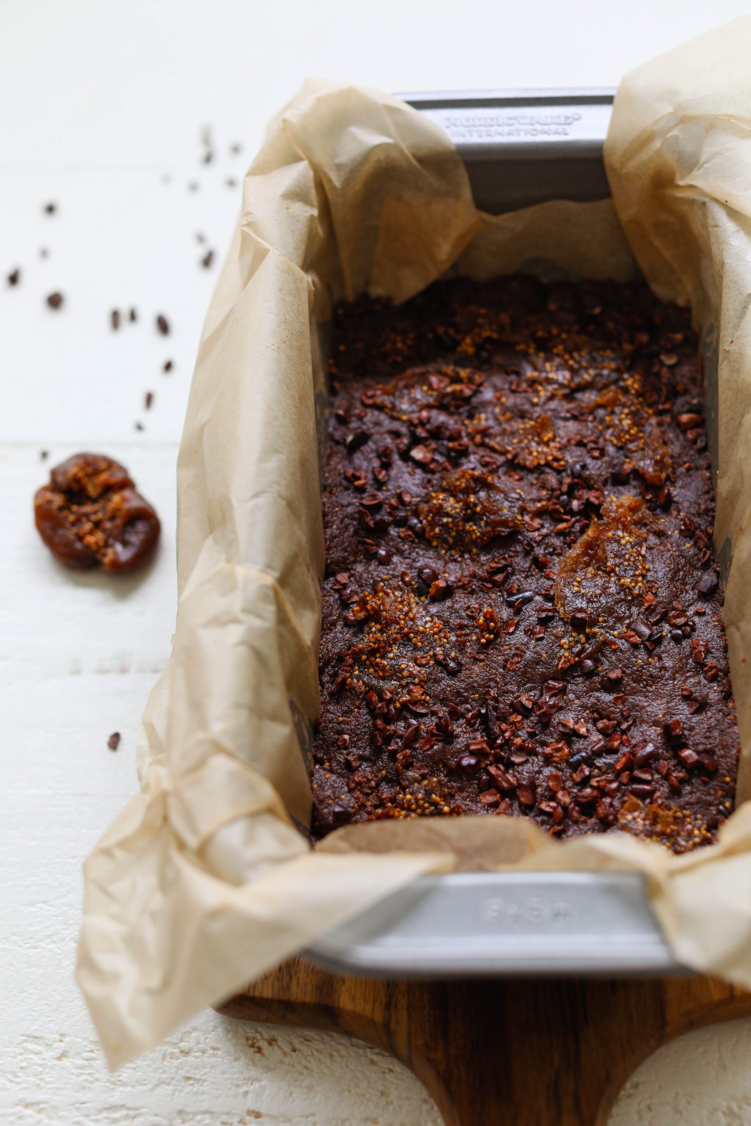 Chocolate Fig Freezer Fudge in parchment lined pan by Flora & Vino 
