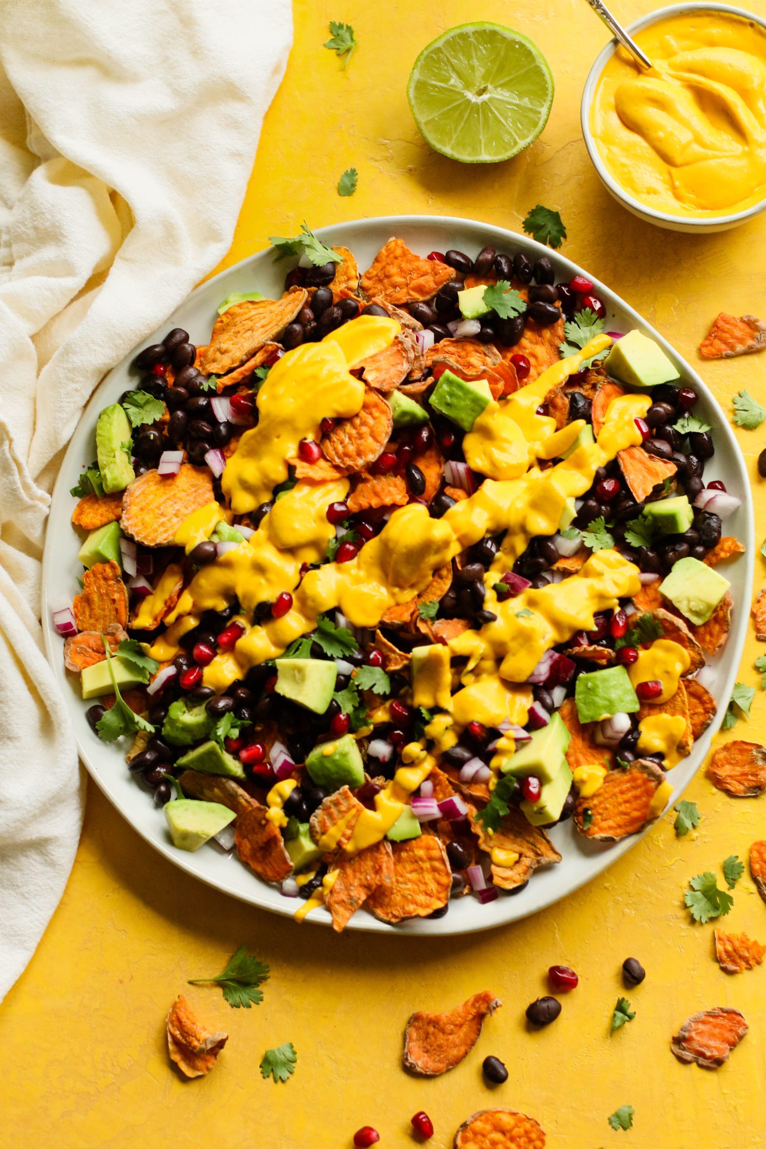 Loaded Vegan Nachos with Black Beans and Spicy Chickpeas