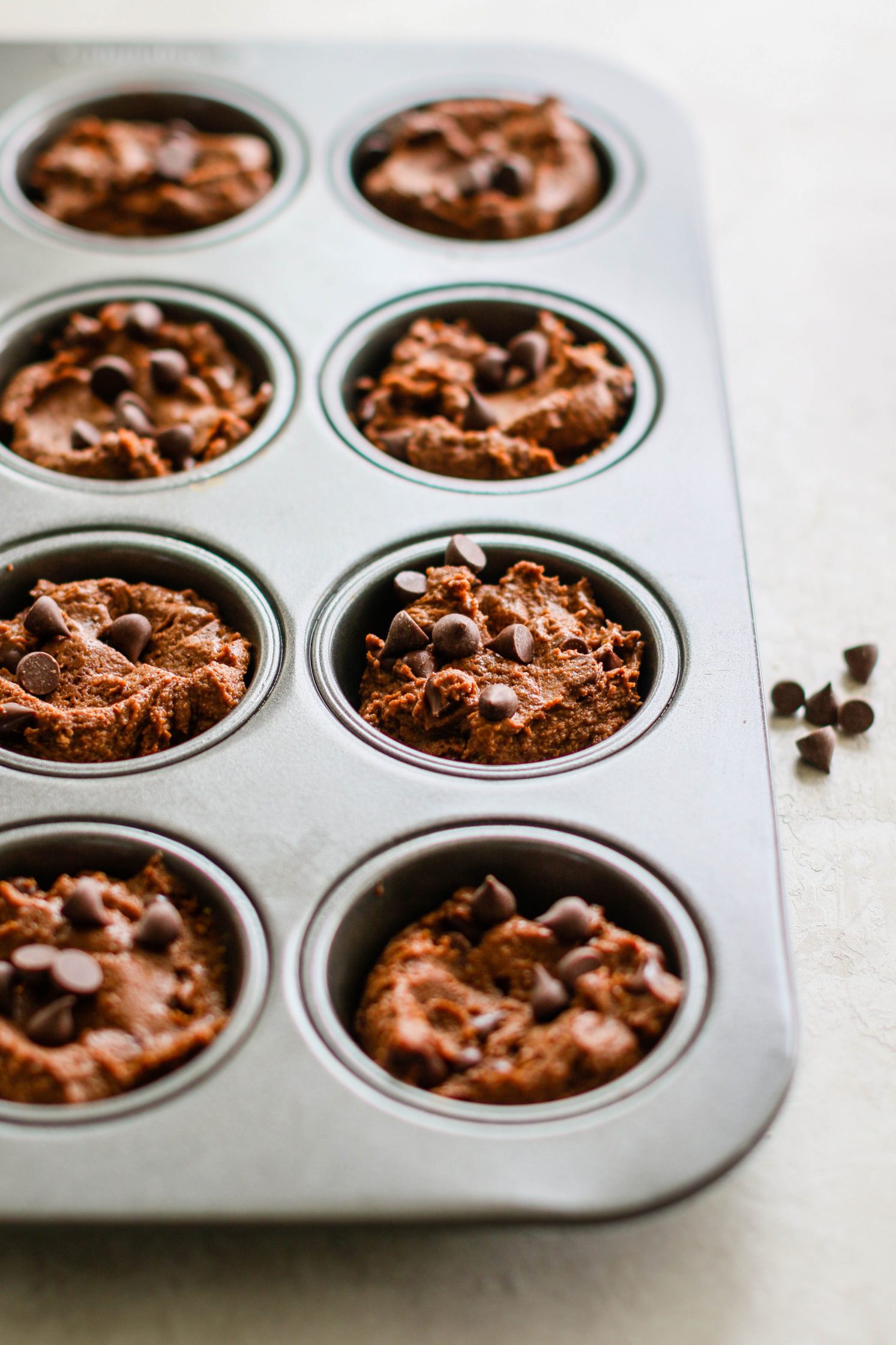 brownies in muffin tin unbaked by Flora & Vino