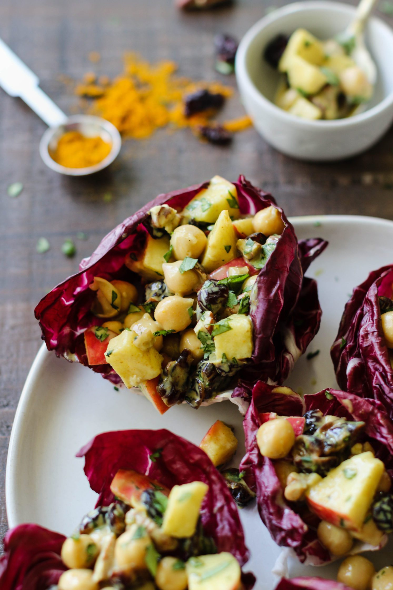 Curried Cranberry Apple Chickpea Salad Cups in radicchio by Flora & Vino