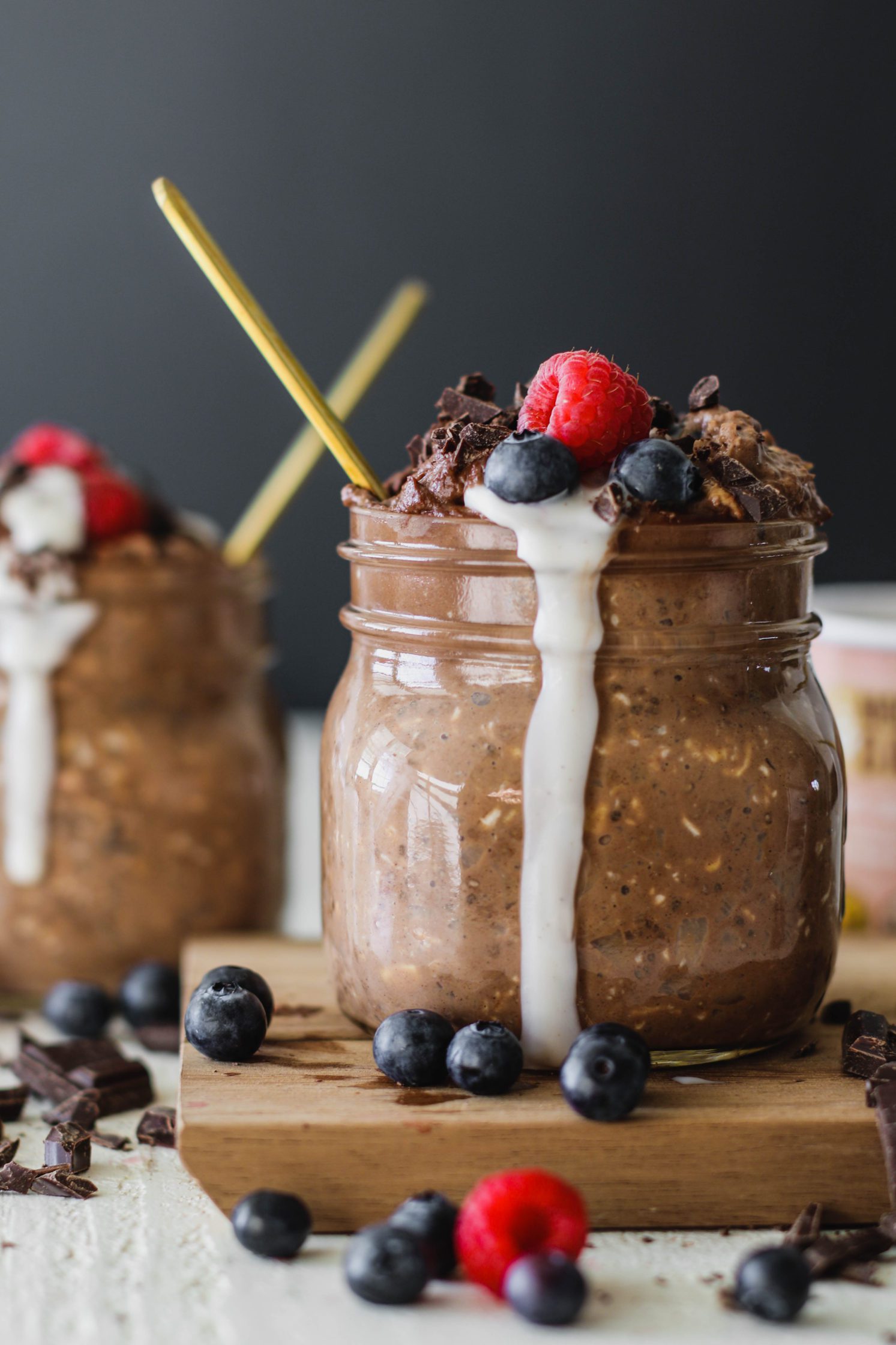 Hot Chocolate Overnight Oats served in mason jars by Flora & Vino