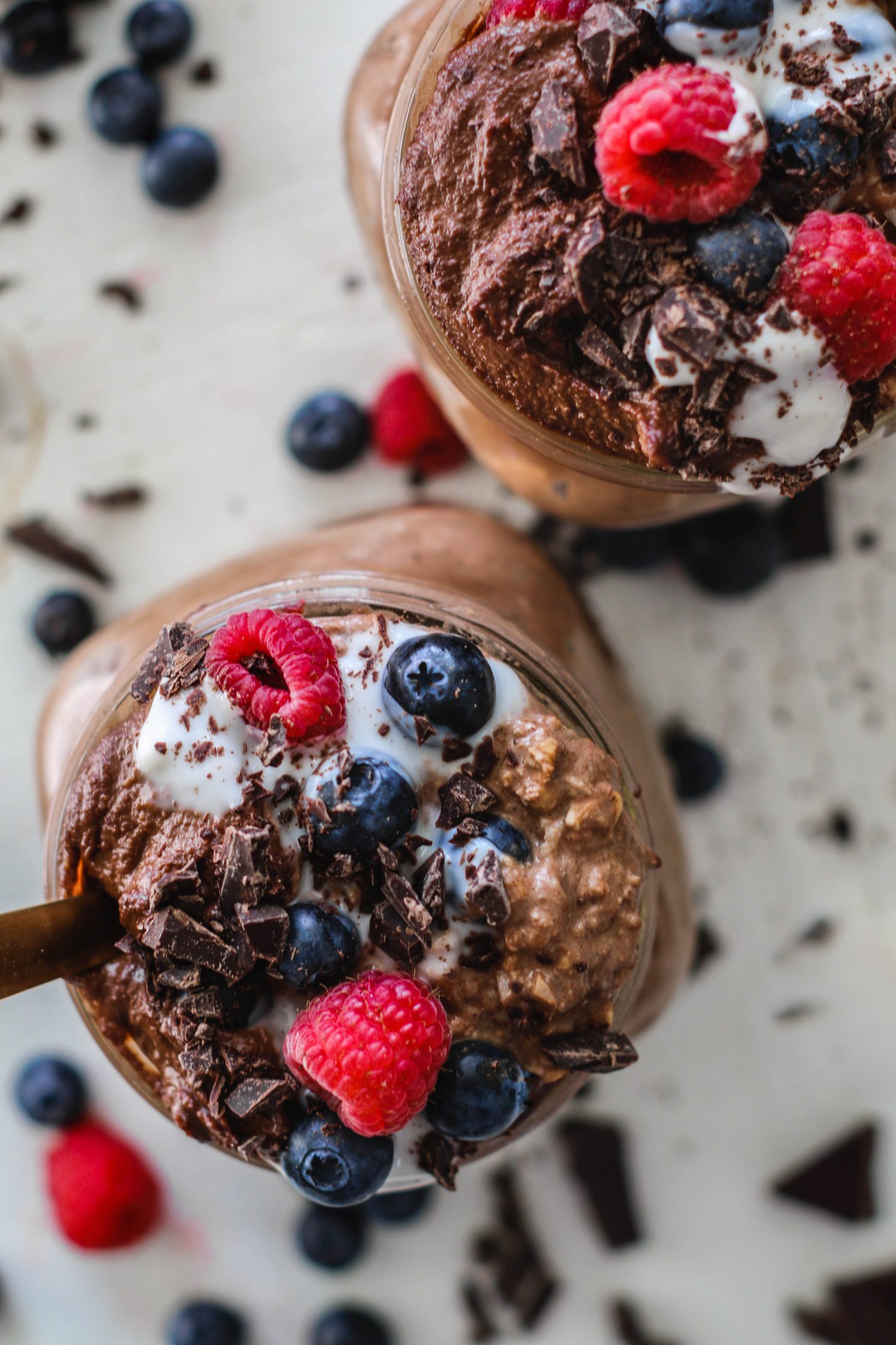 Hot Chocolate Overnight Oats topped with Chocolate Cashew Cream by Flora & Vino