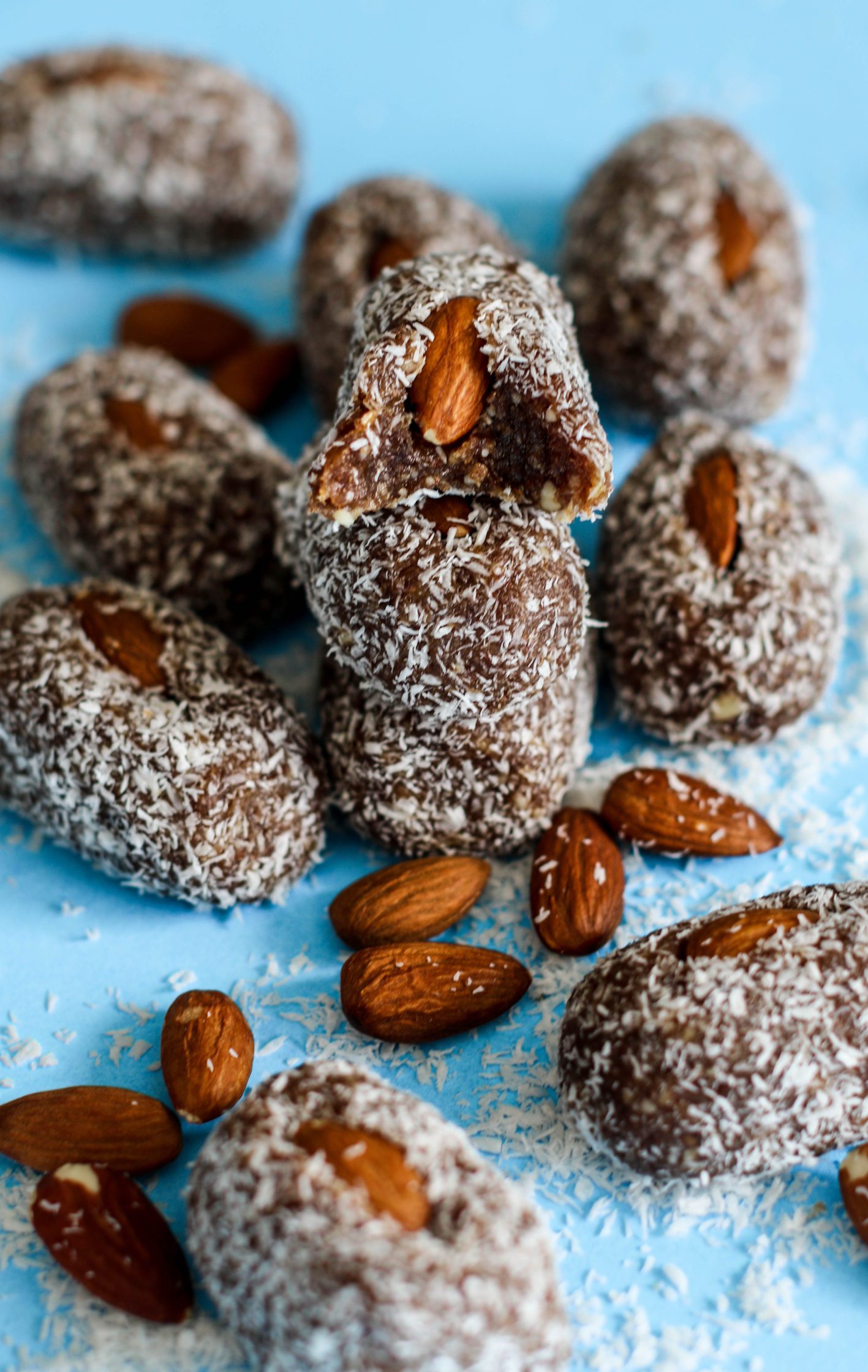 Coconut Almond Rolled Dates stacked by Flora & Vino