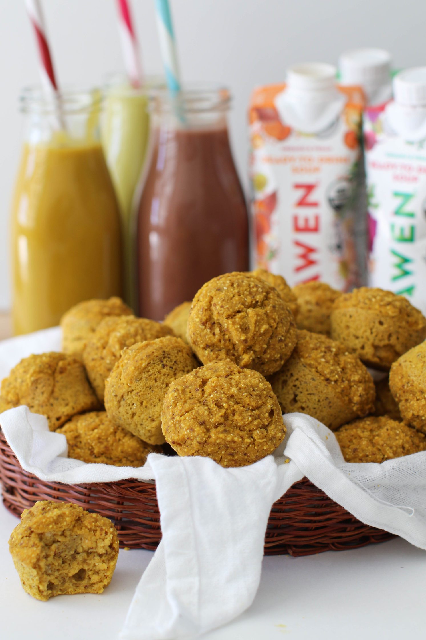 Pumpkin Cornbread Mini Muffins served in woven basket with white towel