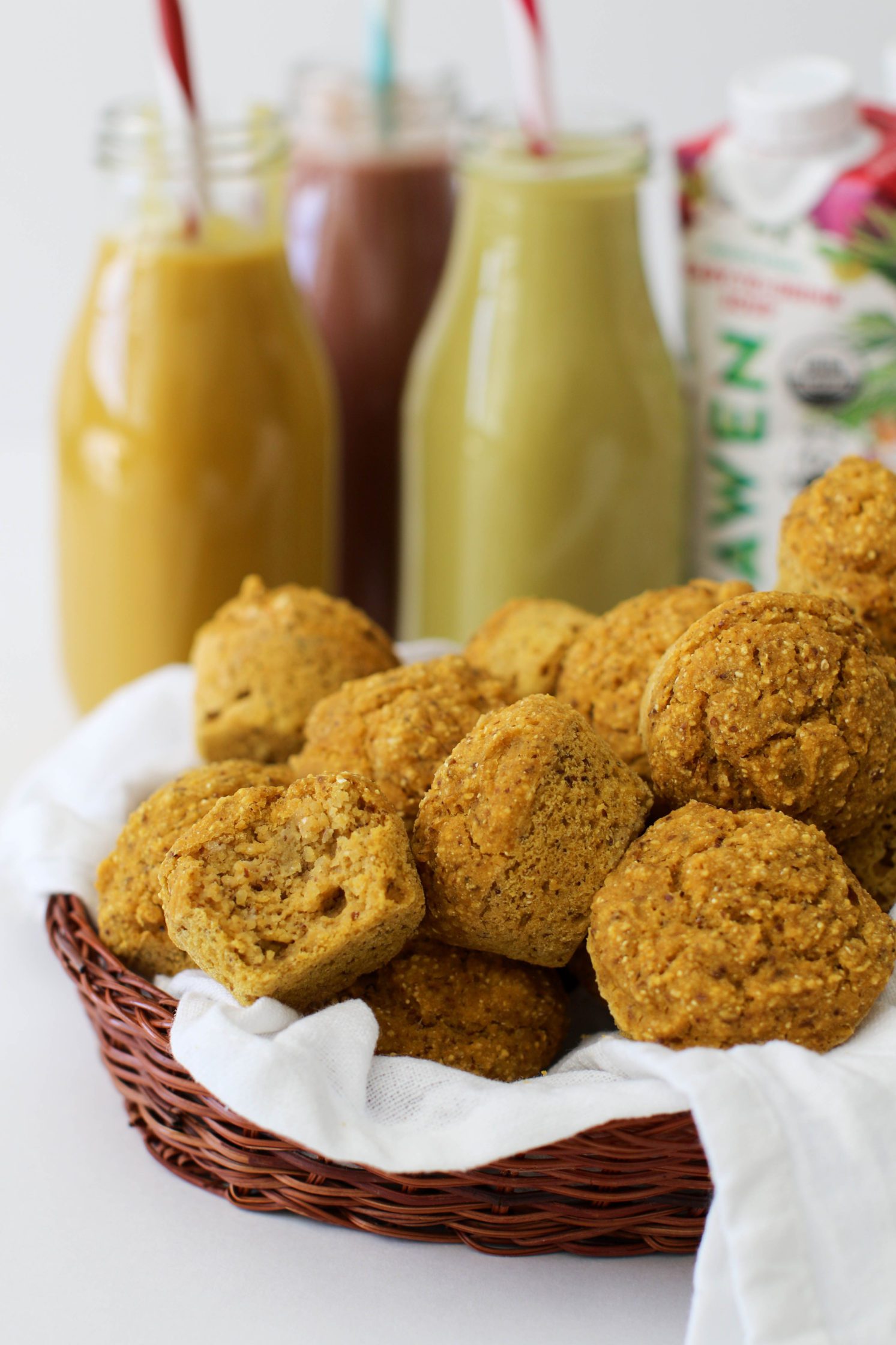 Pumpkin Cornbread Mini Muffins served in woven basket with white towel