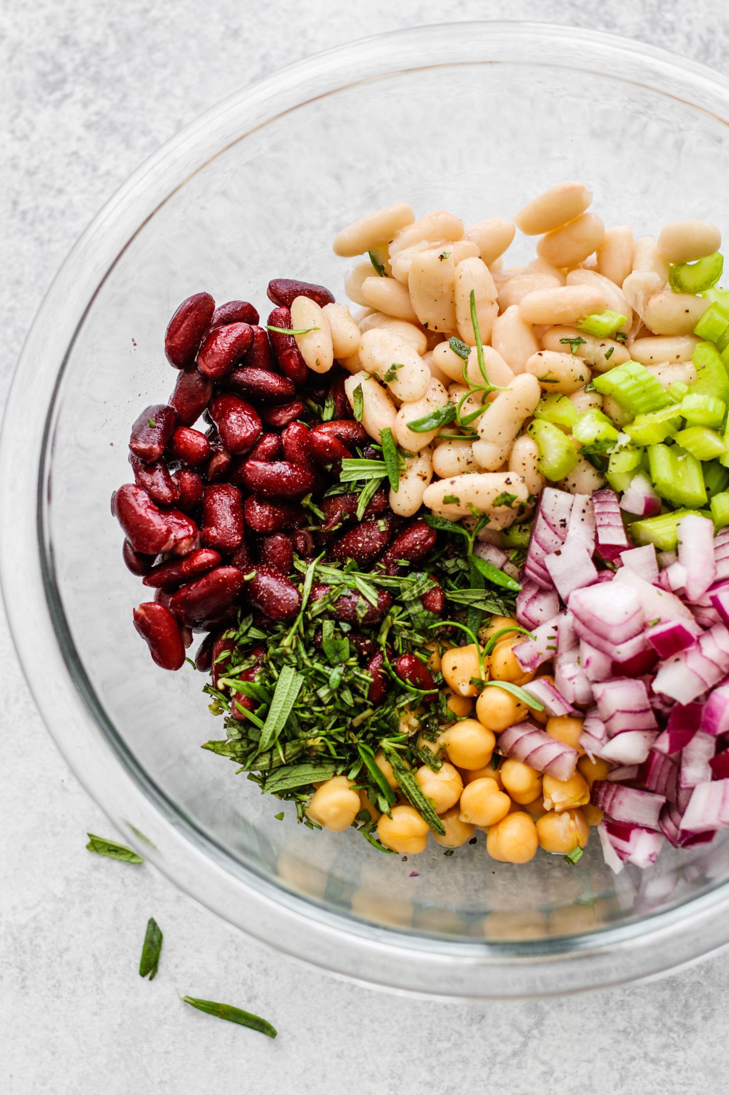Oil-Free Rosemary Three Bean Salad mixed in glass bowl 