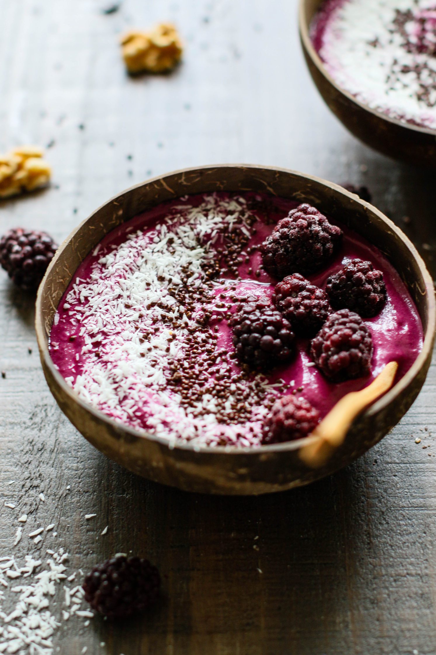 Blackberry Beet & Walnut Smoothie Bowl (Banana-Free) served in coconut bowls with frozen blackberries and raw walnuts scattered