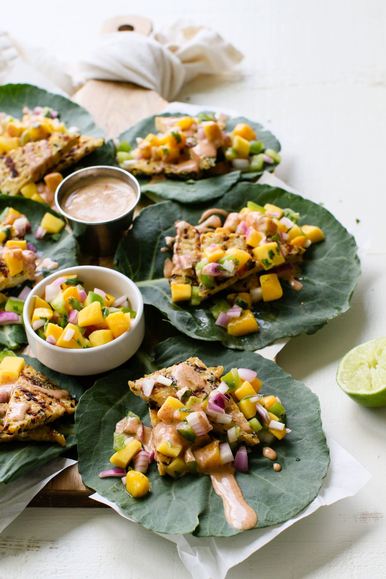 Grilled Tempeh Collard Wraps with Mango Salsa & Spicy Almond Butter Sauce 
