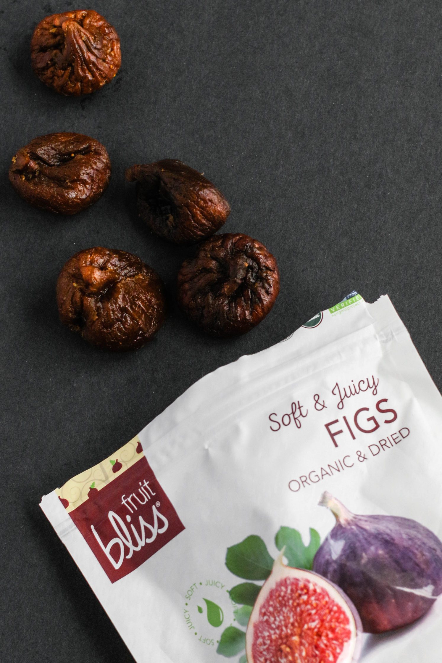 Fruit Bliss Organic Turkish Figs on black paper 