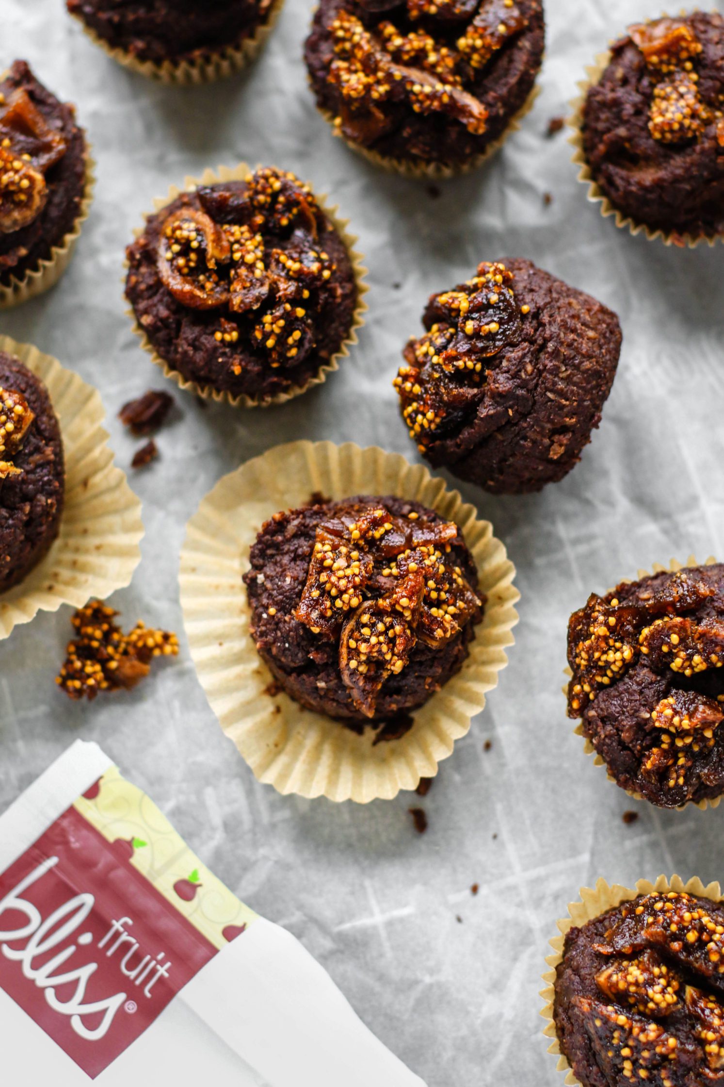 Chocolate Fig Hazelnut Mini Muffins on parchment paper