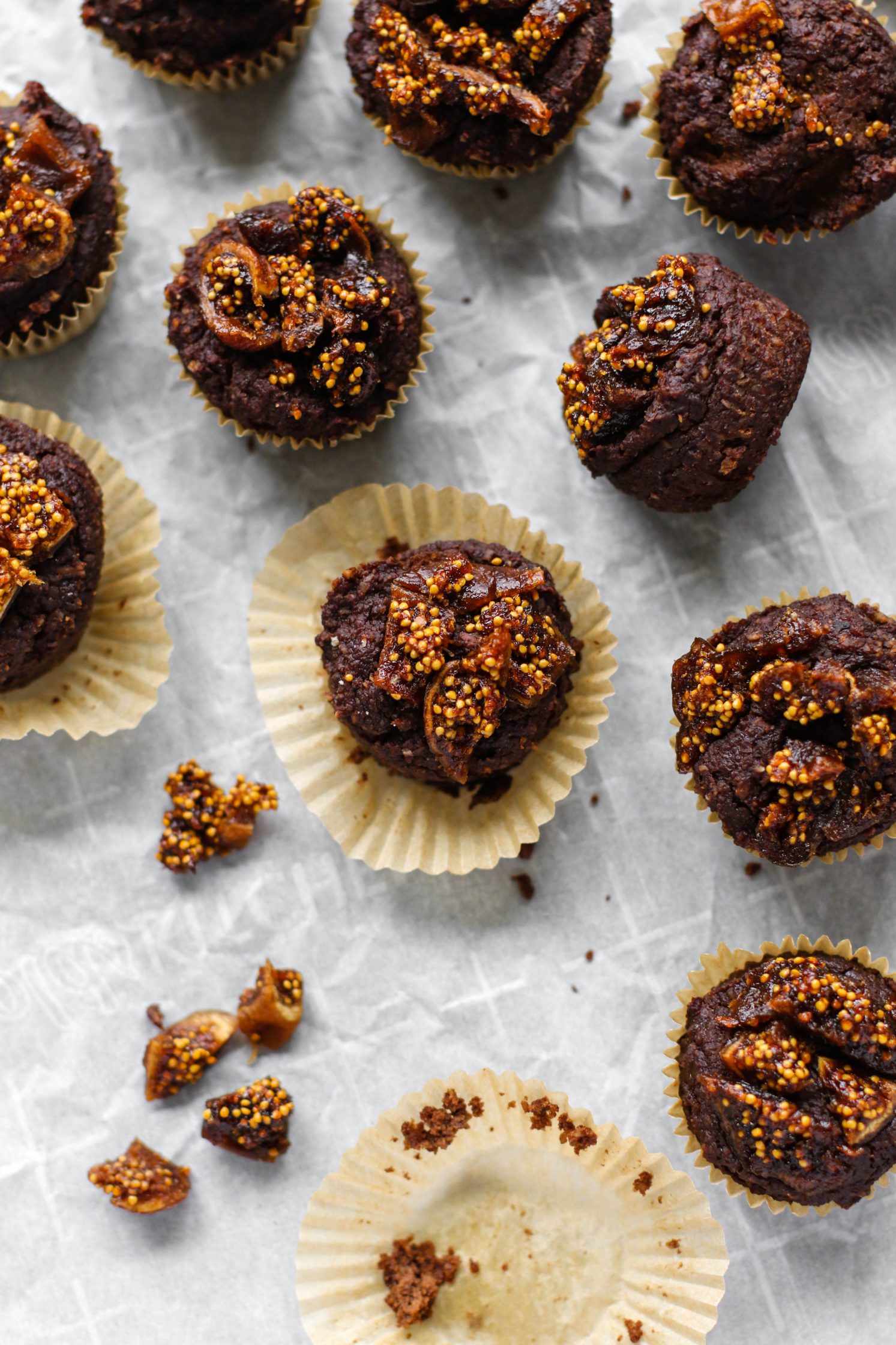 Chocolate Fig Hazelnut Mini Muffins on parchment paper 