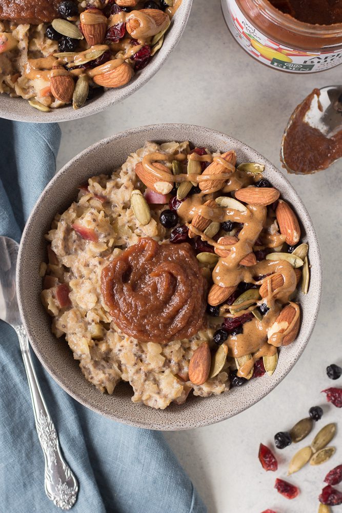 Apple Butter Stovetop Oats with almond butter on top by Flora & Vino