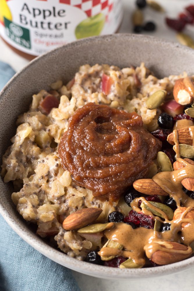 Apple Butter Stovetop Oats served with apple butter on top by Flora & Vino