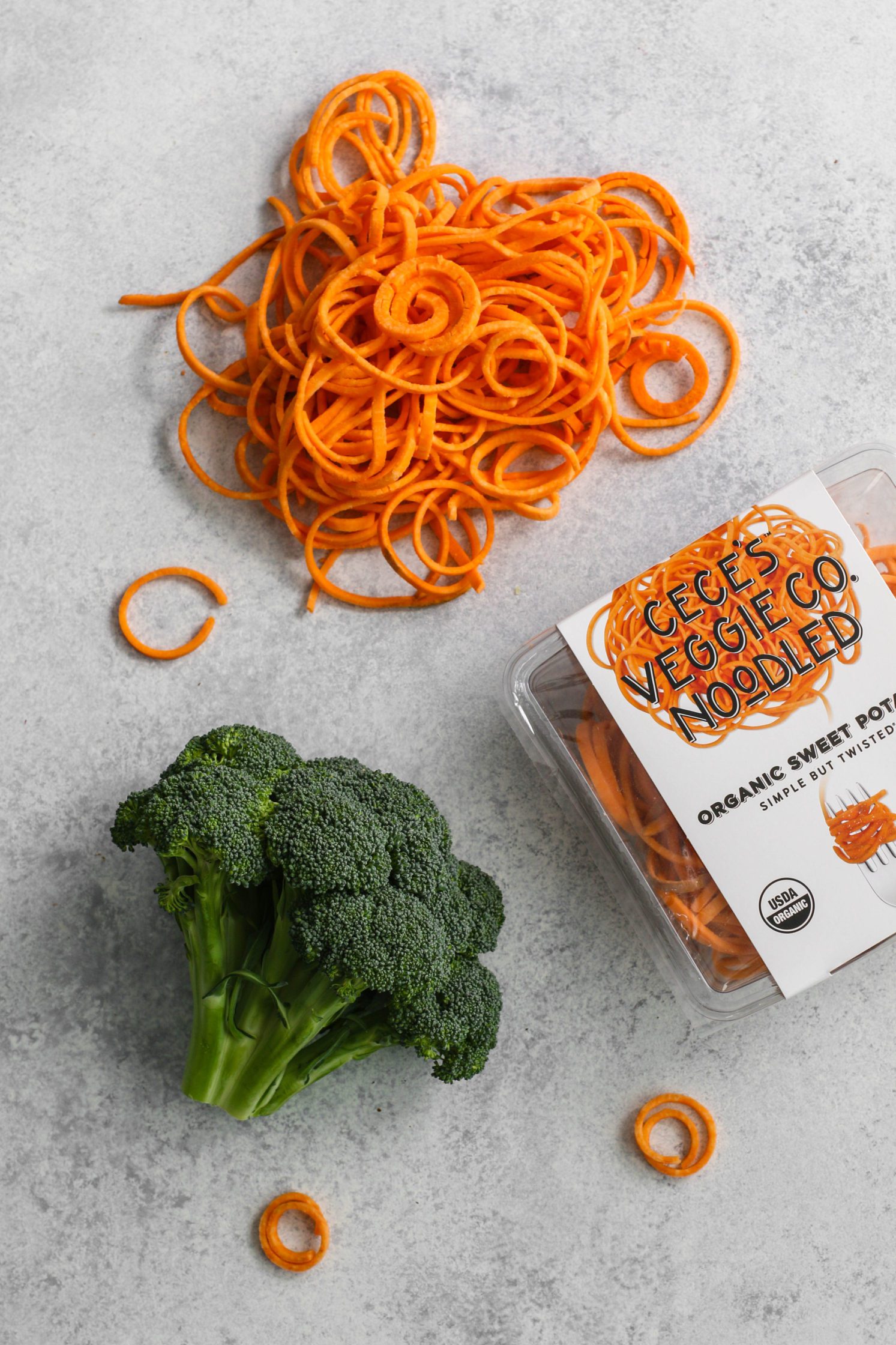 sweet potato noodles and head of broccoli by Flora & Vino