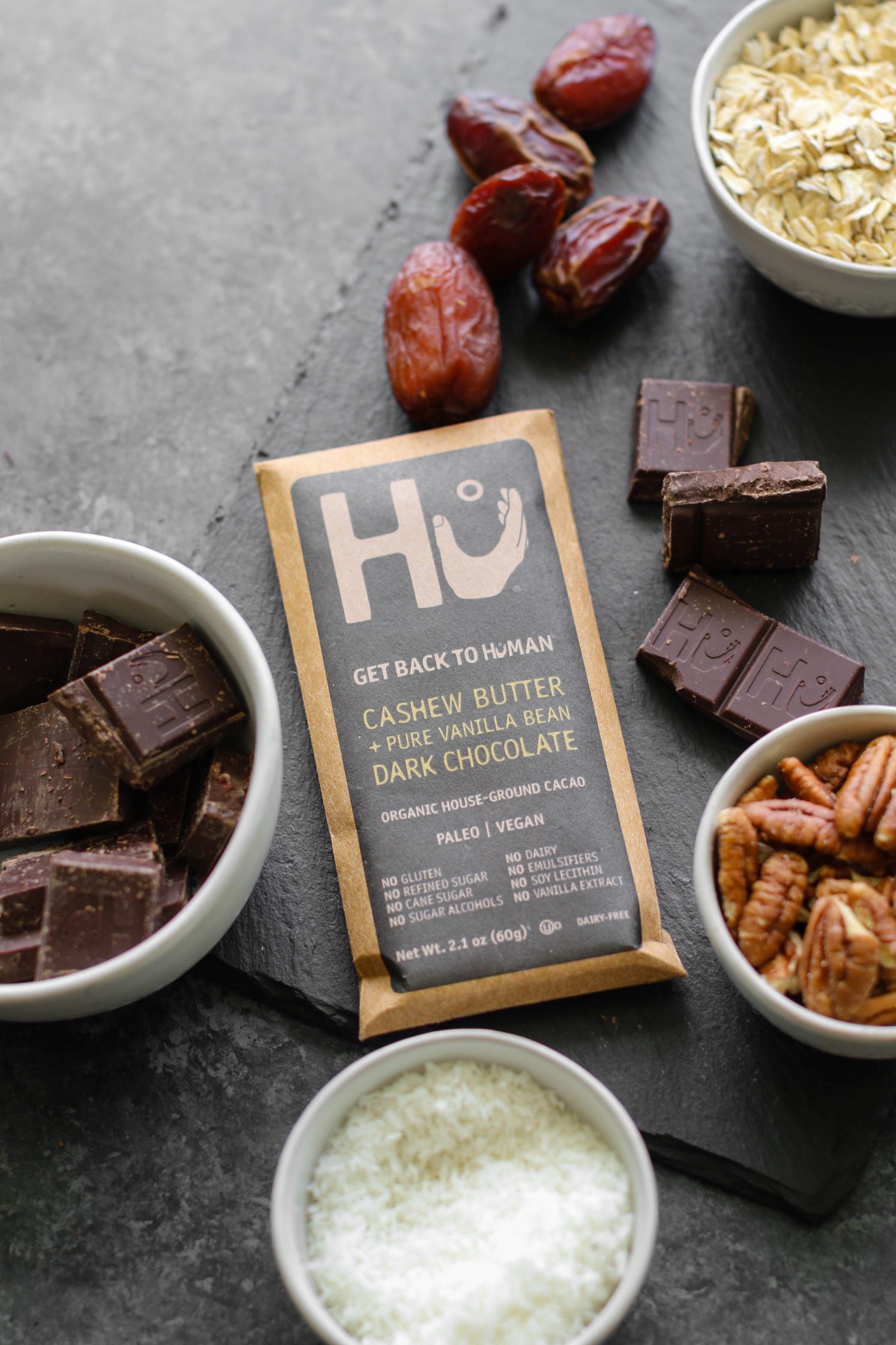 Hu Kitchen Chocolate with shredded coconut, pecans, dates, and oats by Flora & Vino