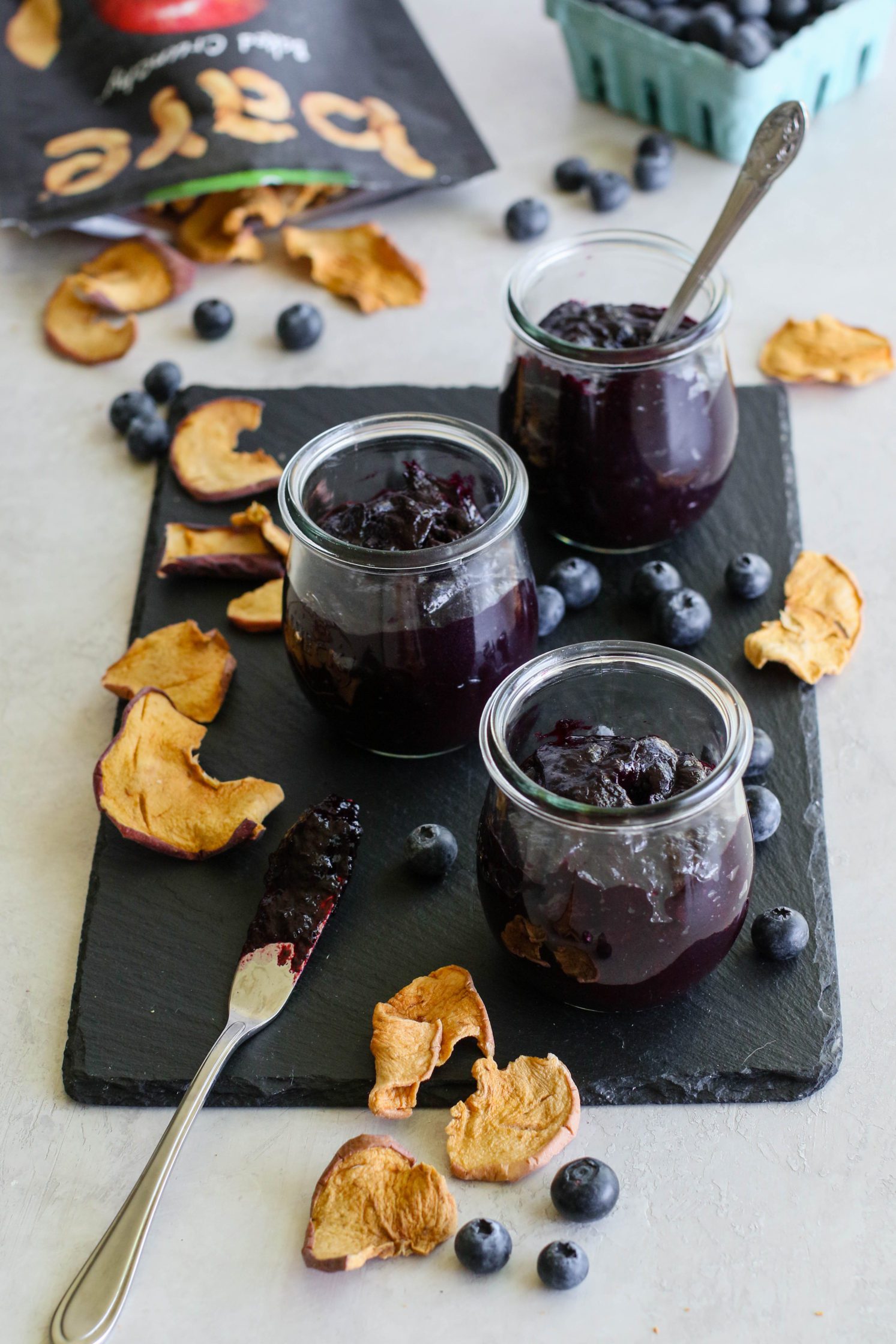 Blueberry Butter (No-Sugar-Added) in jars with apple chips by Flora & Vino 