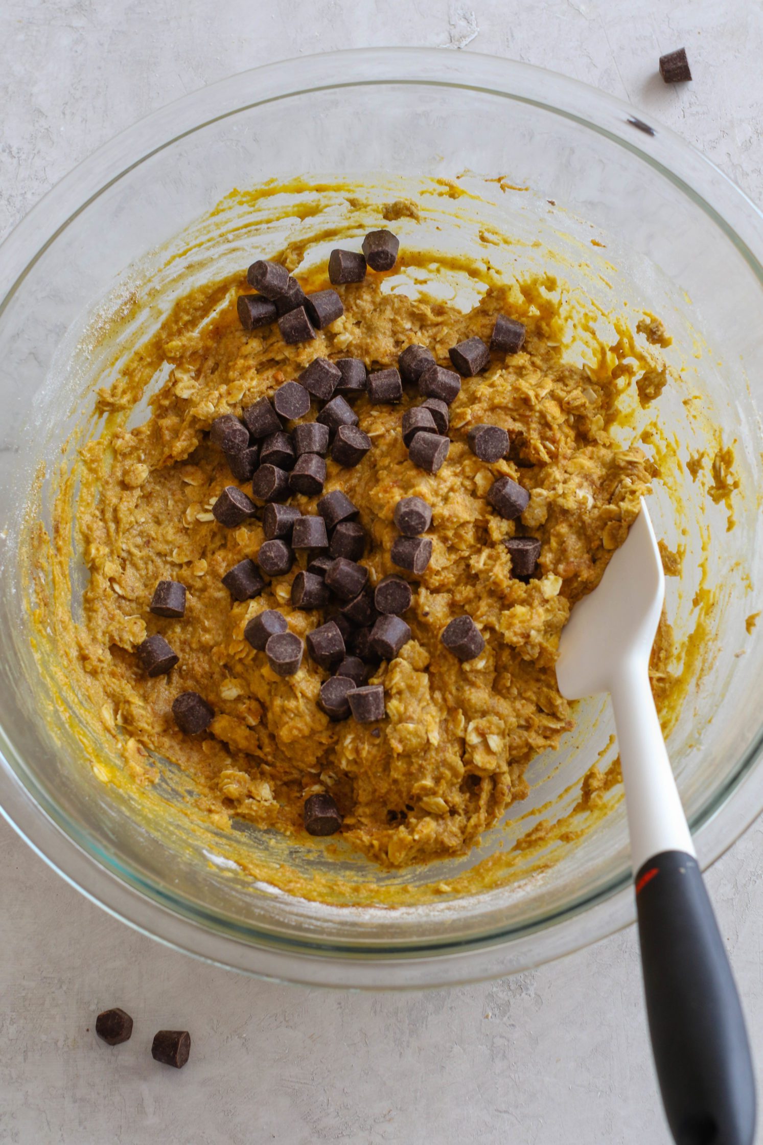 Pumpkin Chocolate Chip Breakfast Bar batter in bowl with spatula