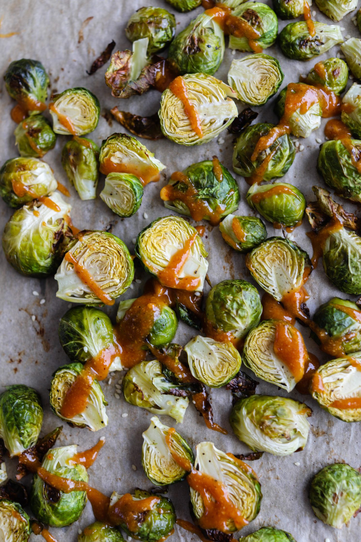 Roasted Brussels Sprouts with Spicy Hazelnut Butter Sauce by Flora & Vino 