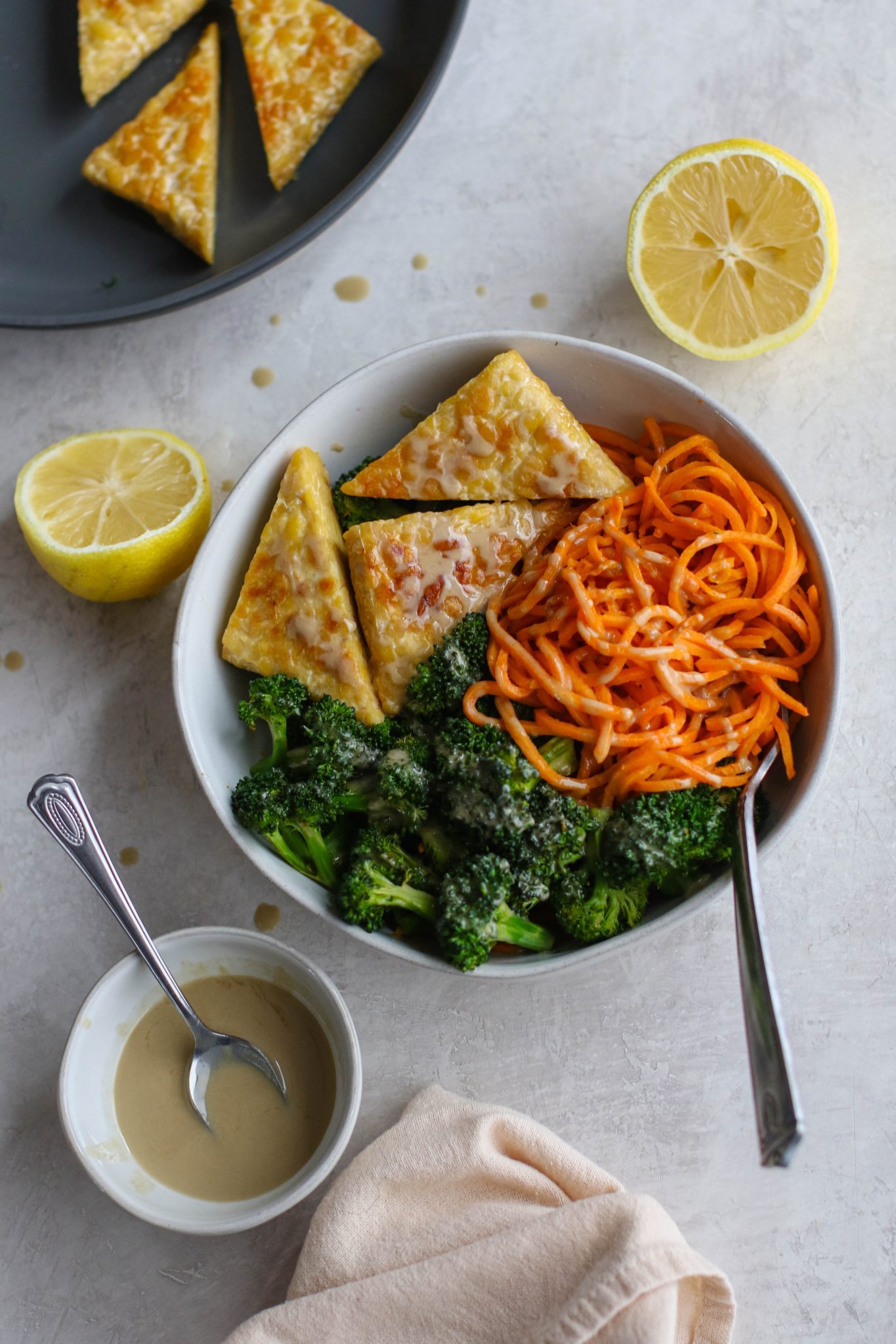 Tahini Tempeh, Sweet Potato Noodle, & Broccoli Bowl by Flora & Vino 