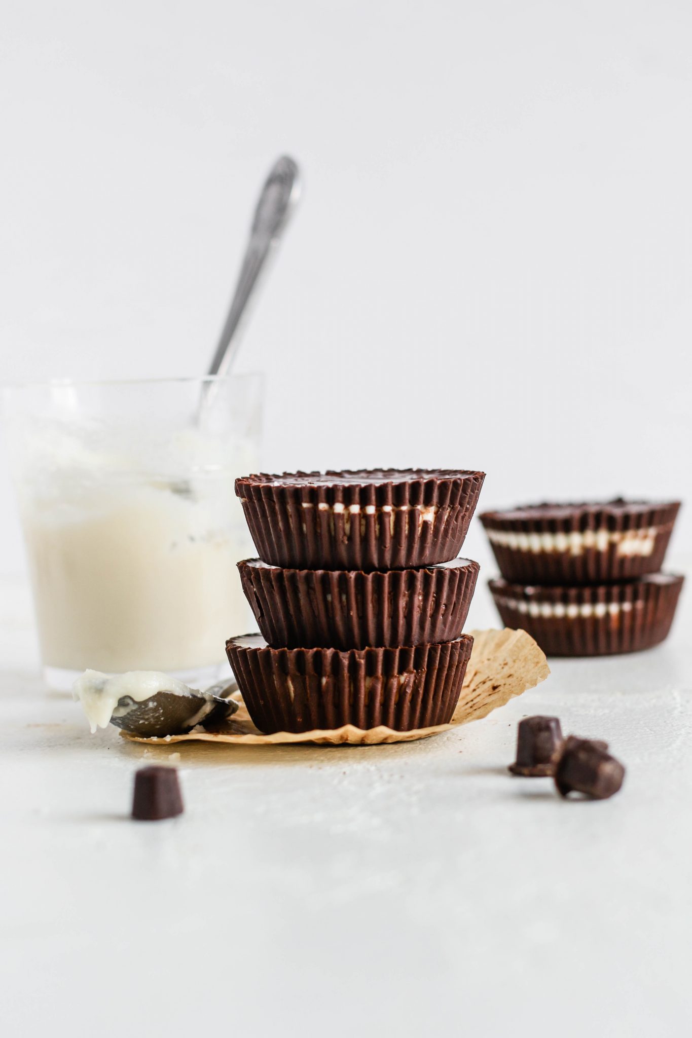 Dark Chocolate Coconut Butter Cups stacked by Flora & Vino