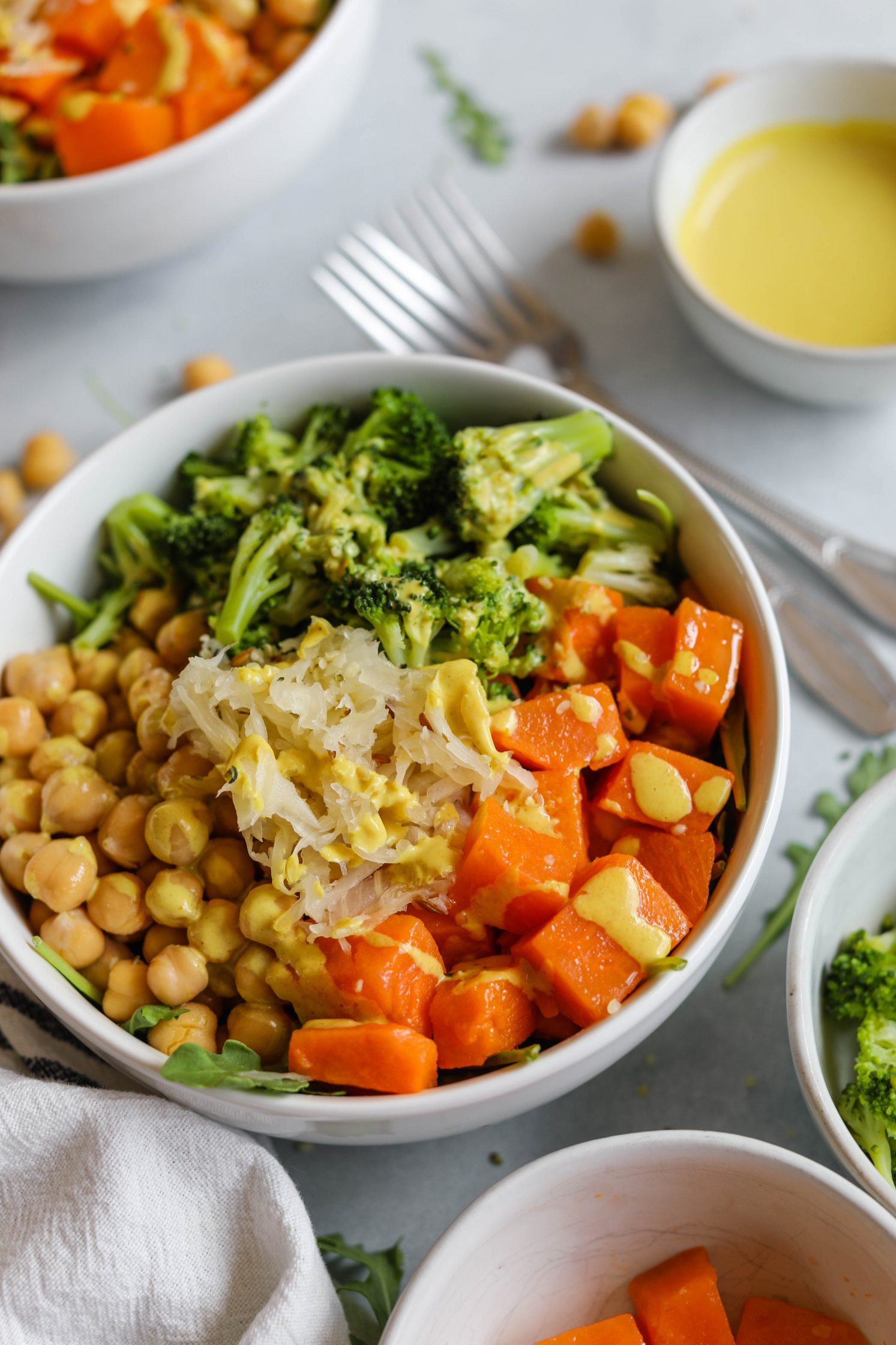Chickpea Meal Prep Bowl served with Turmeric Tahini Dressing by Flora & Vino 