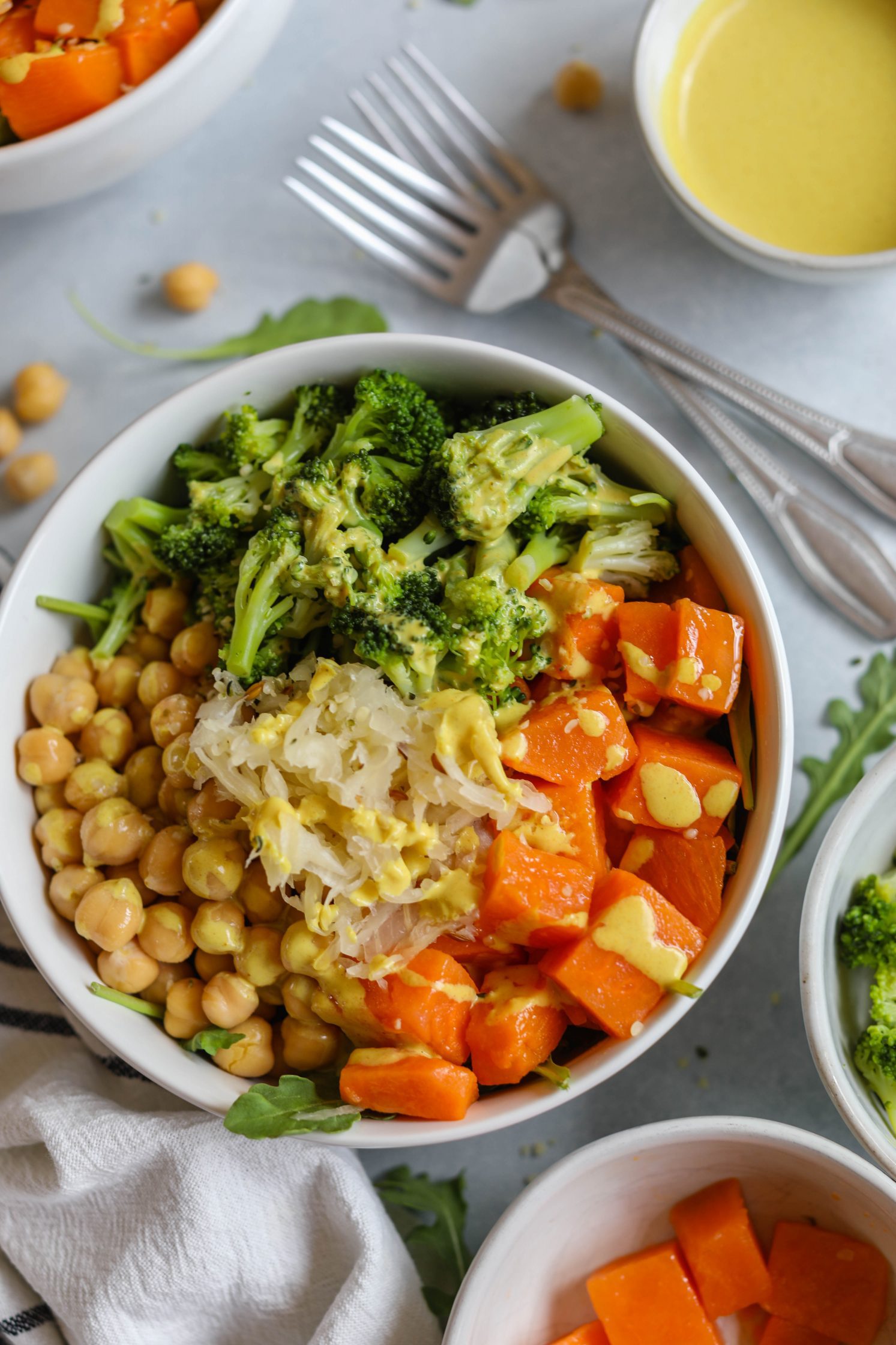 Chickpea Meal Prep Bowl served in a bowl with Turmeric Tahini Dressing by Flora & Vino 