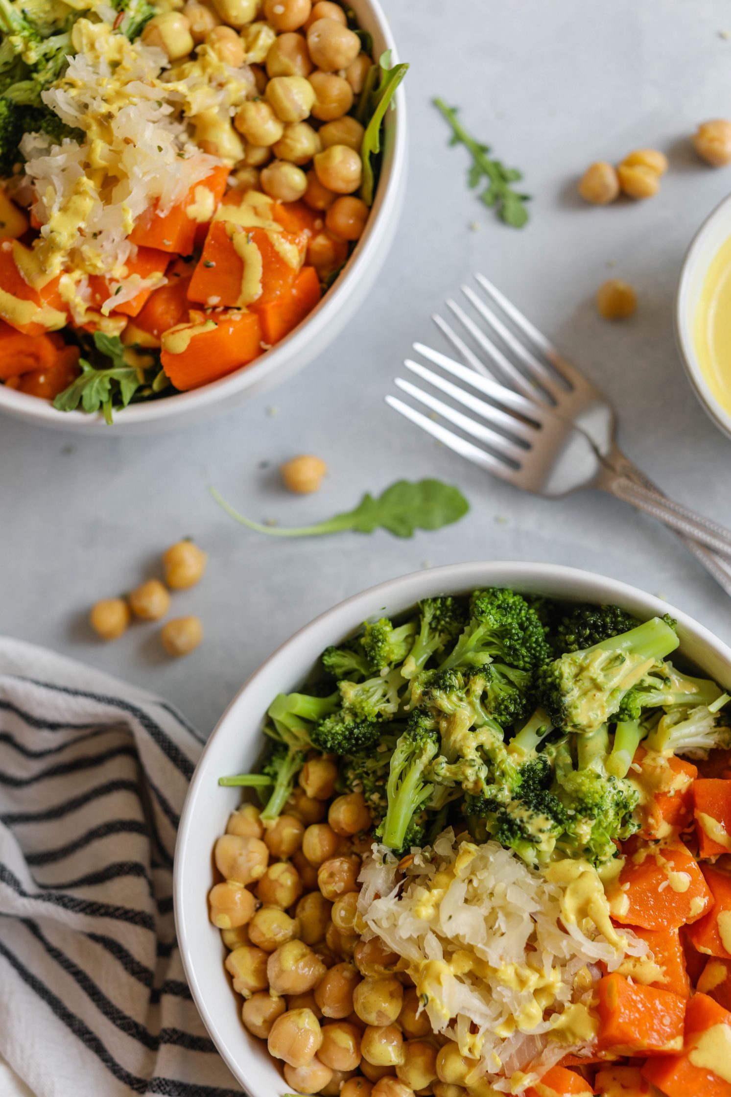 Chickpea Meal Prep Bowl served in bowls with Turmeric Tahini Dressing by Flora & Vino 