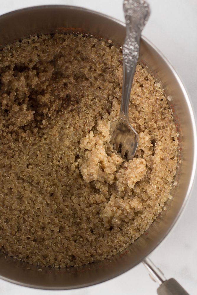 Coconut Quinoa Porridge in saucepan by Flora & Vino