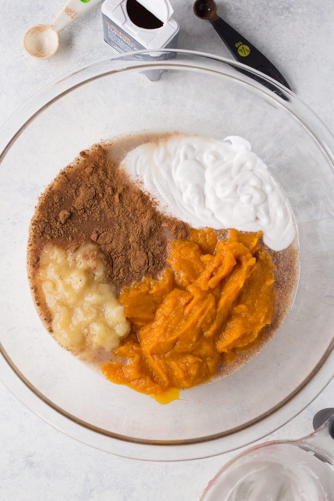 ingredients for pumpkin apple bake in glass bowl