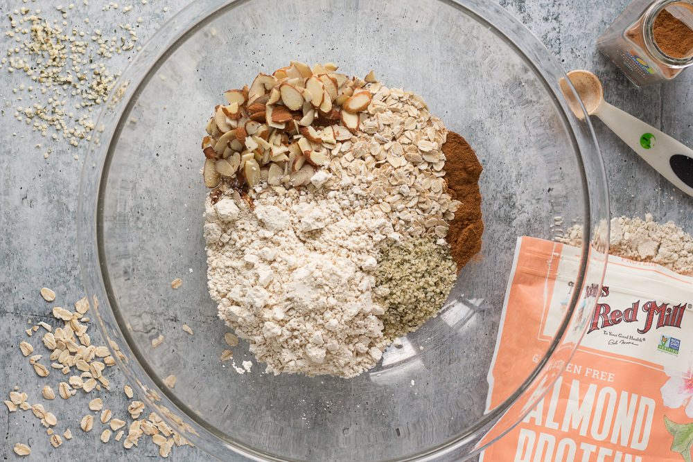 Blueberry Almond Protein Cookie ingredients in large mixing bowl by Flora & Vino