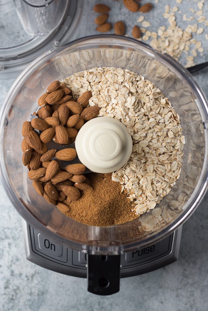 oat-almond crust ingredients in food processor by Flora & Vino 