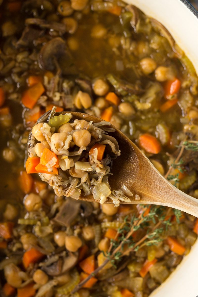 wooden spoon serving Chickpea & Wild Rice Soup by Flora & Vino 