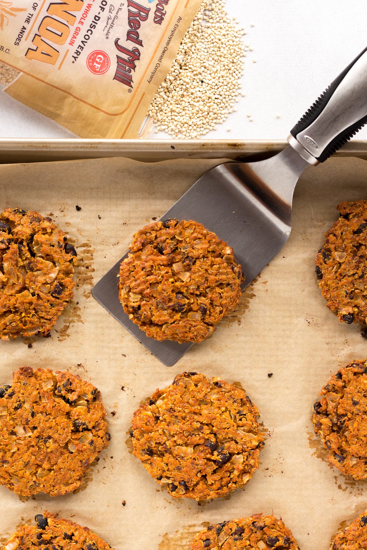 spatula flipping Sweet Potato Black Bean Burgers 