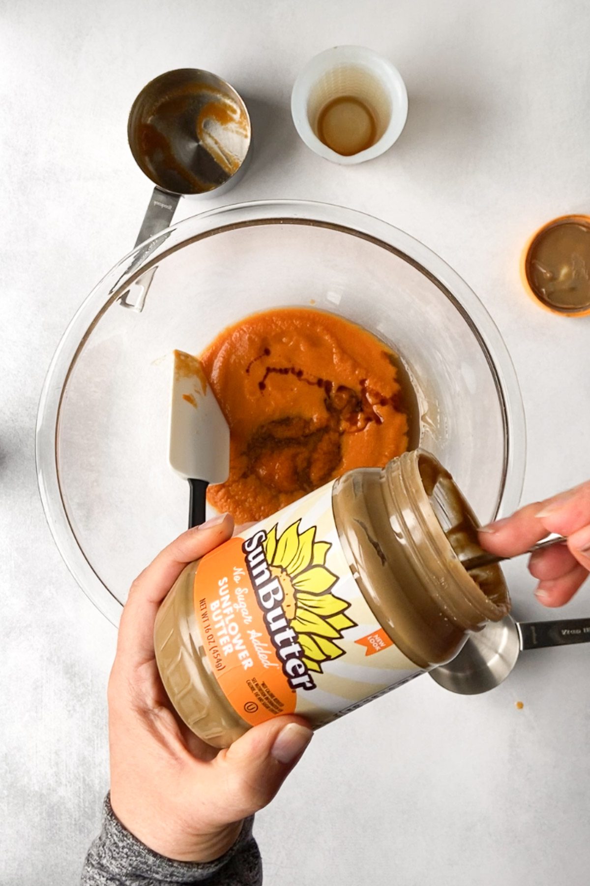 sweet potato smashed in bowl with SunButter by Flora & Vino