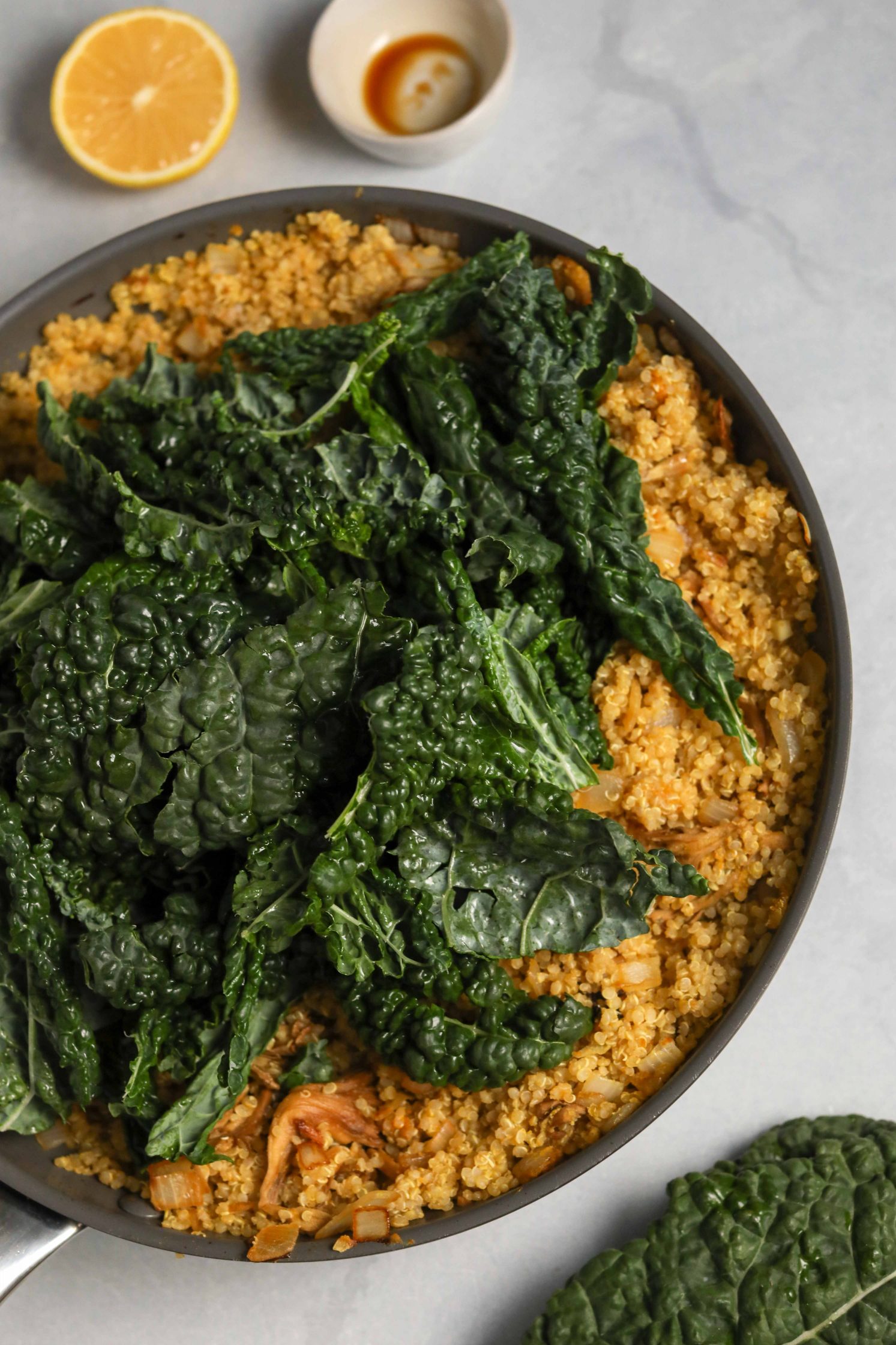 Quinoa Mushroom Risotto in pan with kale on top