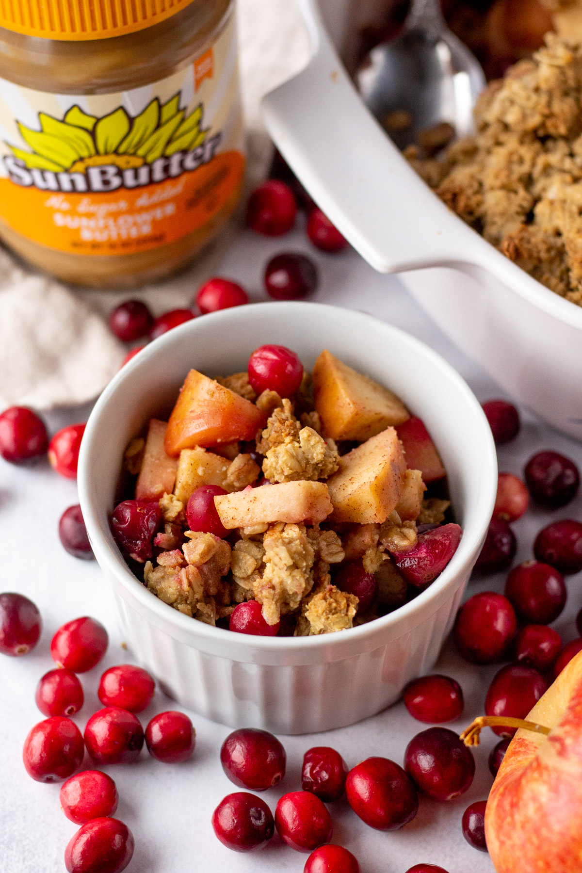 Cranberry Apple Crumble baked and served in ramekin by Flora & Vino