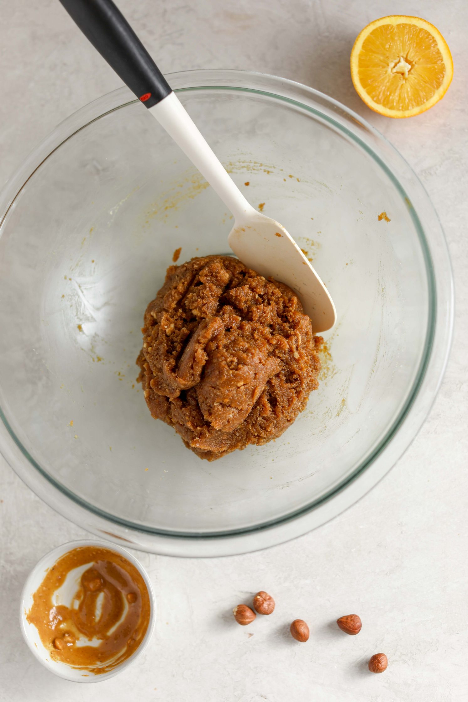 Orange Hazelnut Cookie batter in spatula by Flora & Vino 