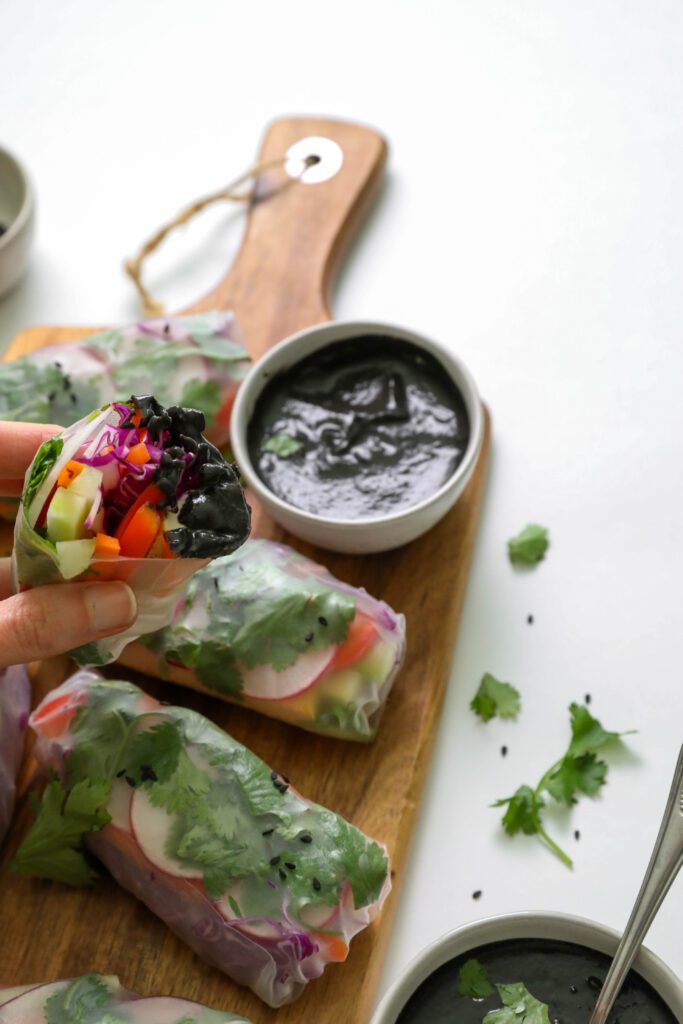 Rainbow Rice Paper Wraps with Black Sesame Sauce by Flora & Vino
