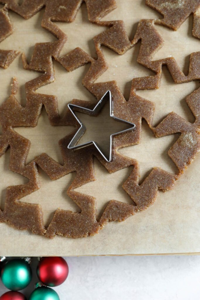 cookie dough with star cookie cutters by Flora & Vino