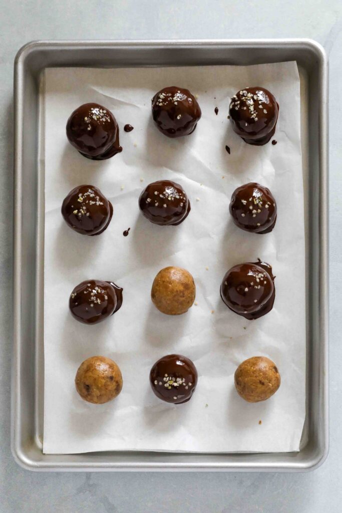 Cookie Dough Protein Truffles dipped in chocolate by Flora & Vino 