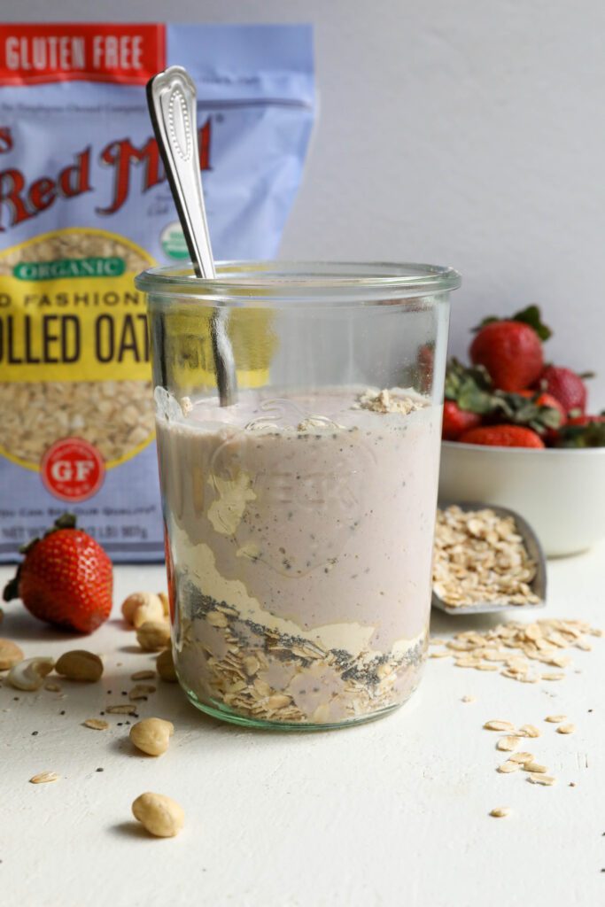Strawberry Cheesecake Overnight Oats mixed with Bob's Red Mill Old-Fashioned Rolled Oats by Flora & Vino