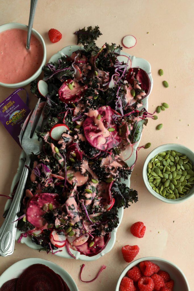 Beet & Kale Salad served on platter with Raspberry Vinaigrette by Flora & Vino