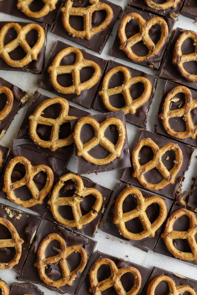Orange Chocolate Pretzel Bark broken into pieces by Flora & Vino