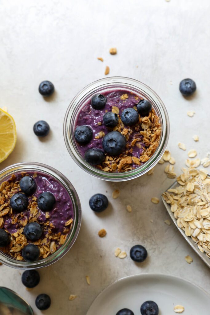 Blueberry Protein Overnight Oats in mason jars by Flora & Vino