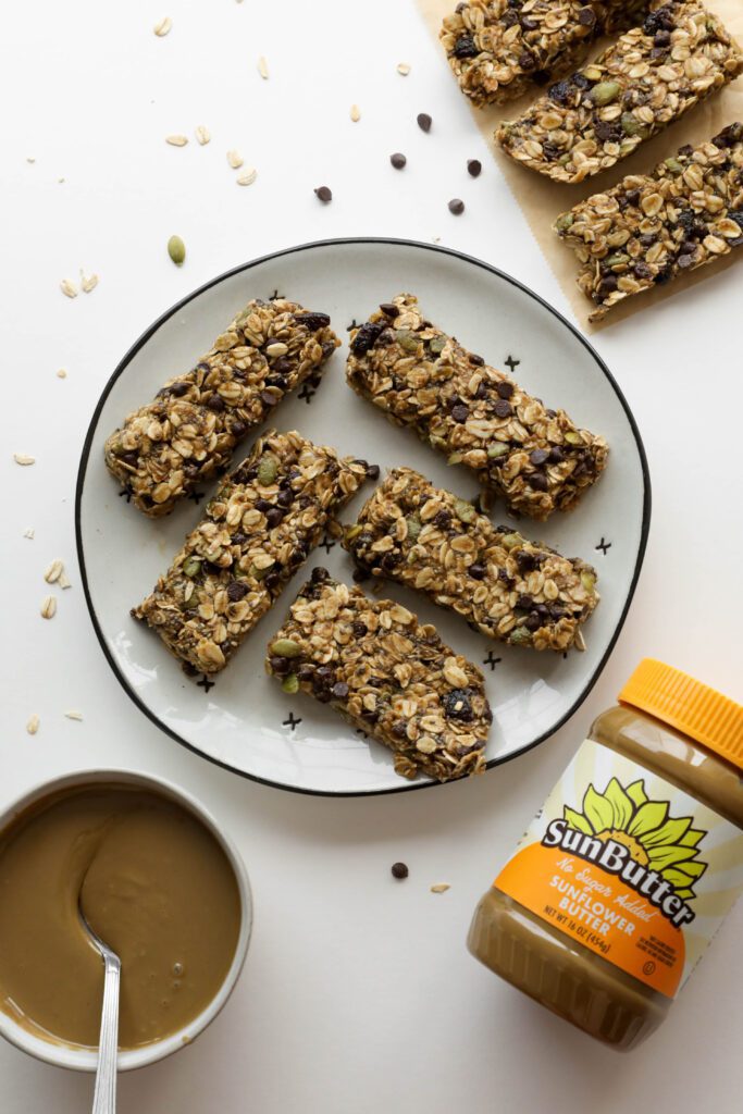 Nut-Free SunButter Granola Bars on plate plus SunButter by Flora & Vino